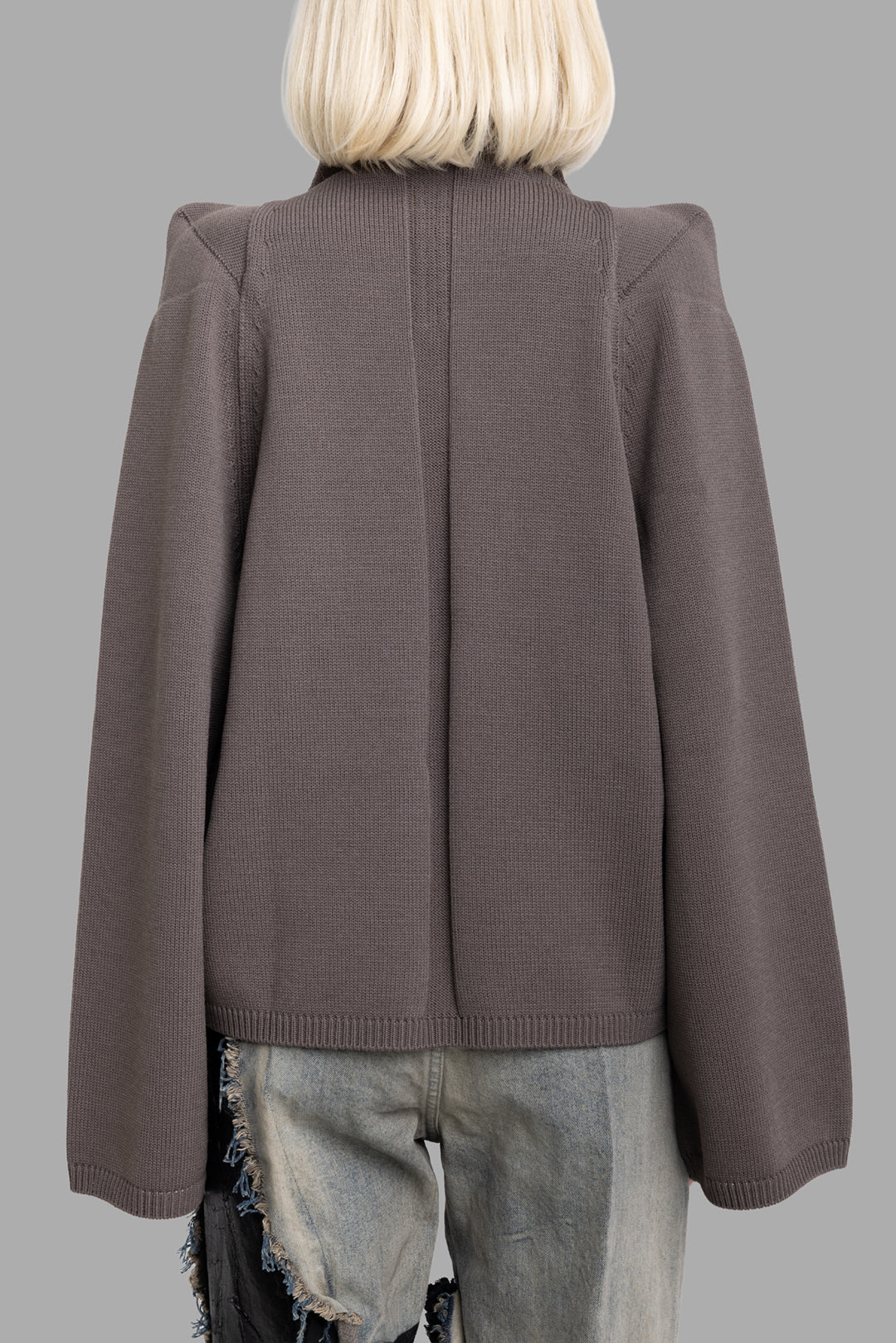 Rick Owens women's darkdust funnel-knit sweater, back view with vertical spine channel and relaxed wide sleeves