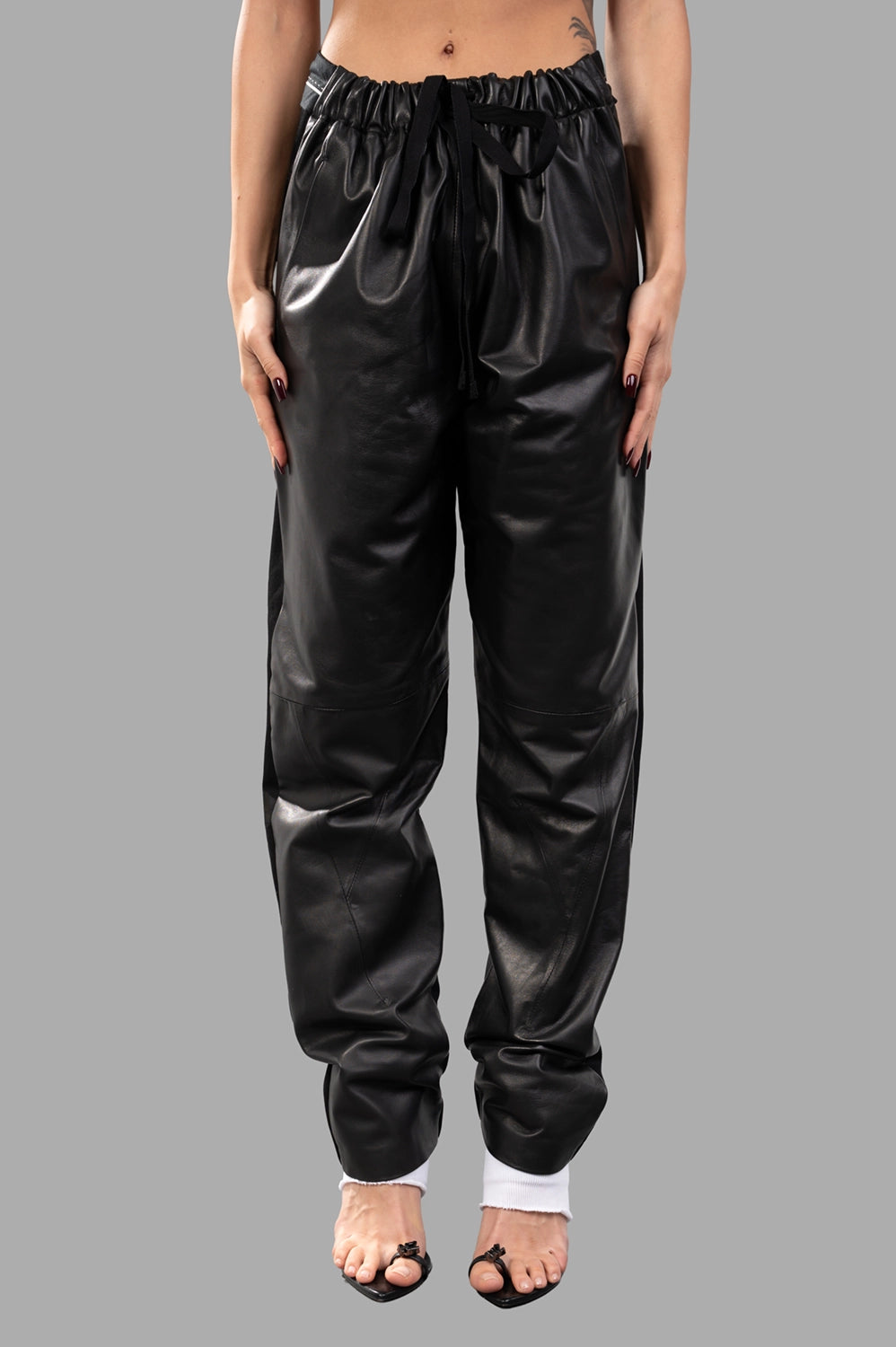Front close-up of elastic waist with drawstring and smooth front panels