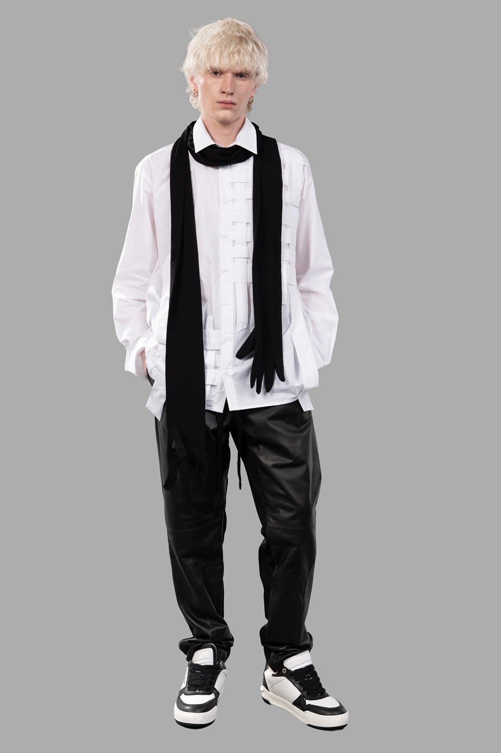 Full-length view of white long-sleeve shirt with woven panel detail at front, relaxed fit