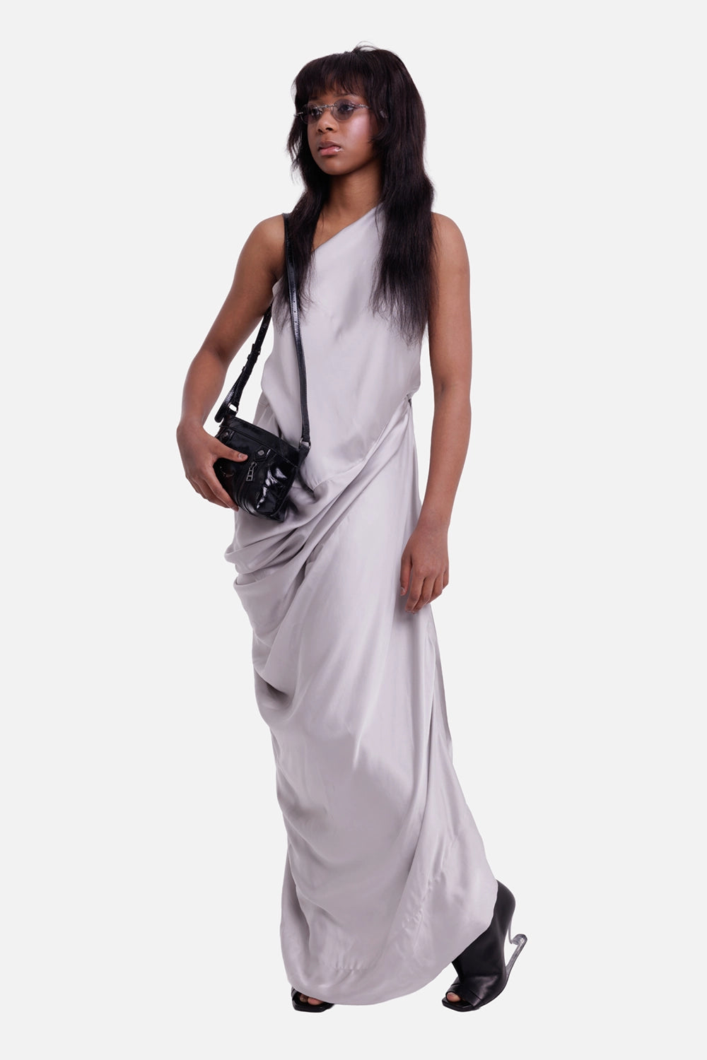 Vivienne Westwood women's mother-of-pearl maxi dress, model view with one-shoulder neckline and hip draping