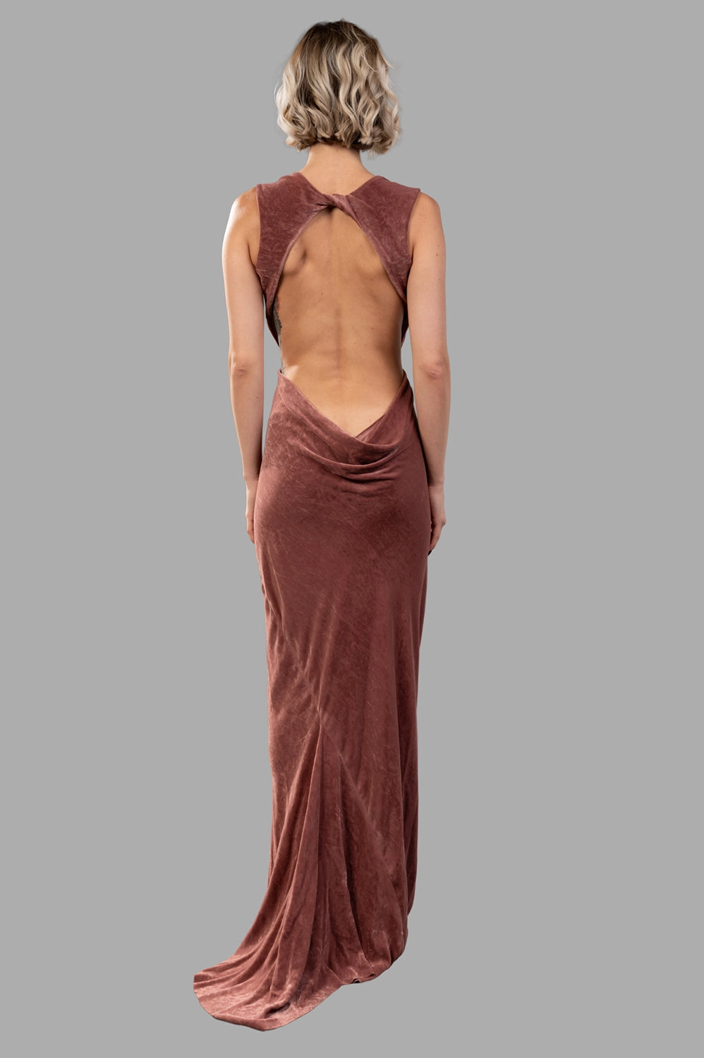 Rick Owens gown in rosewood, back view, open back with twisted strap and cowl drape