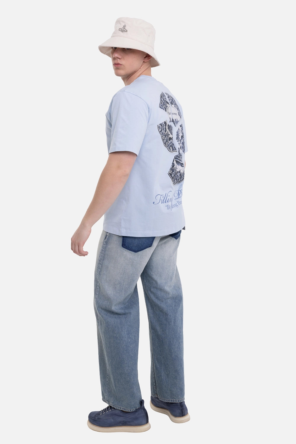 Filling Pieces unisex T-shirt in skyway, on-model full-length back view with large Broken Plate graphic