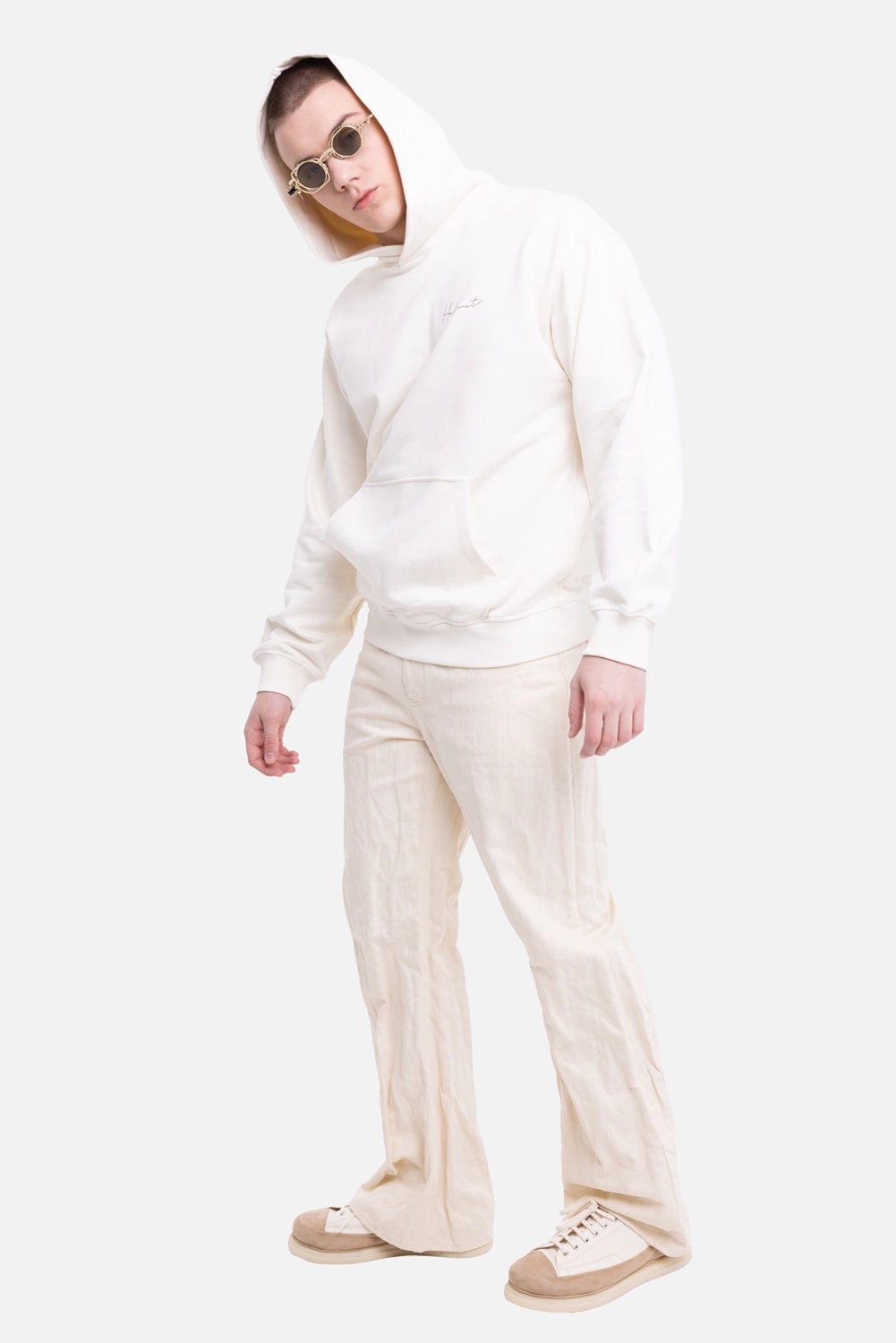 Helmut Lang men's hoodie in vintage white, on-model full-length view, relaxed fit with kangaroo pocket