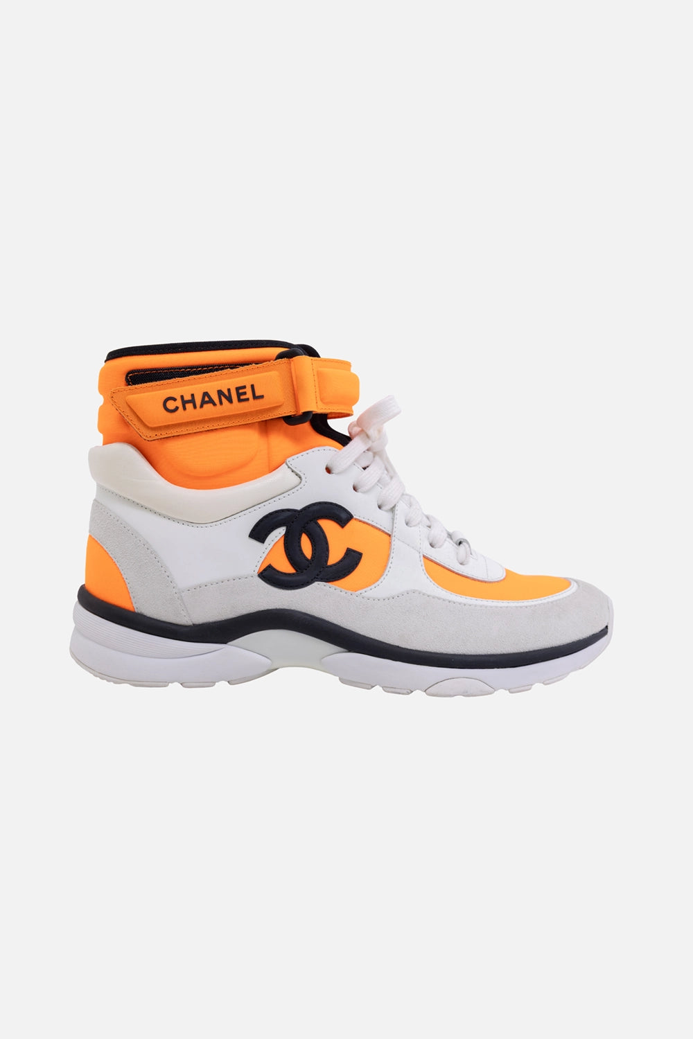 Pre-owned Chanel high-top sneakers in white and orange, side view, velcro ankle strap and interlocking CC patch
