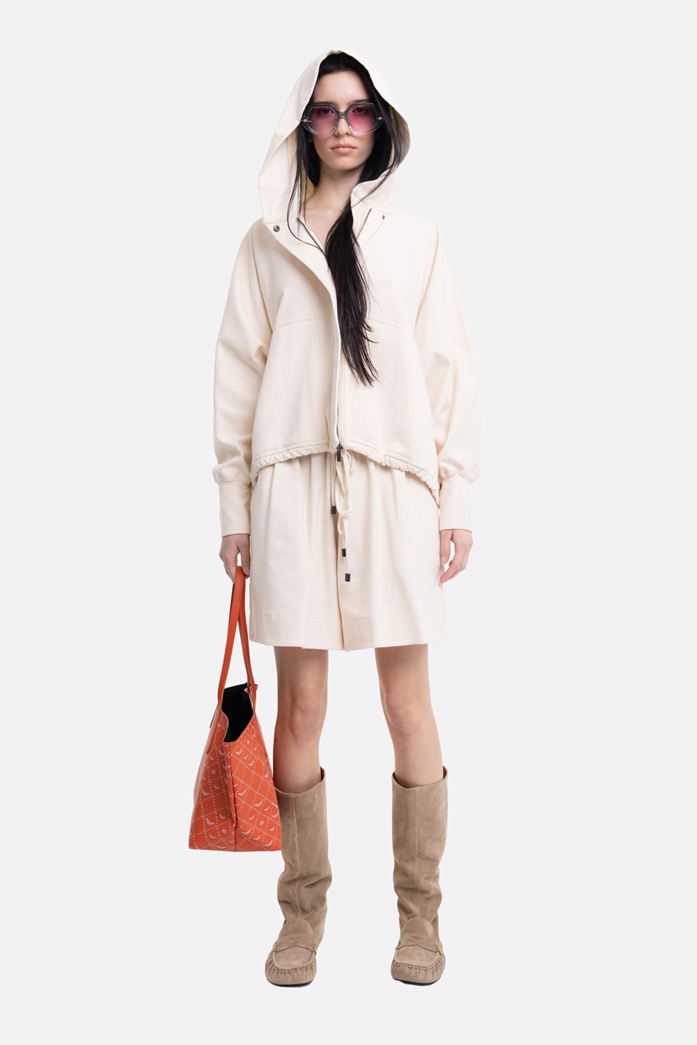 Gentry Portofino women's hooded bomber jacket in ecru, on-model full length, oversized hood and metal-tipped ties