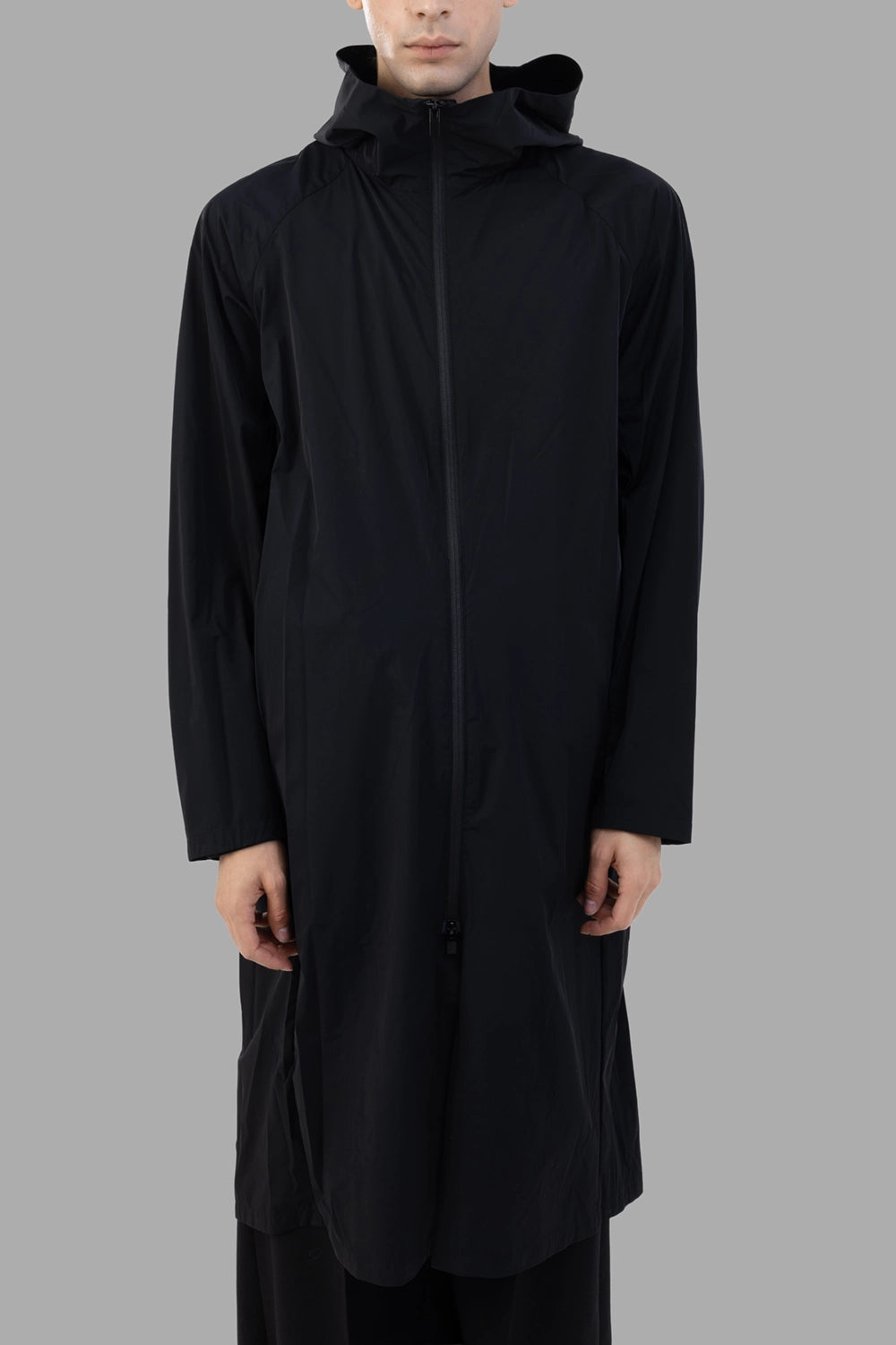 Attachment hooded coat in black, front view, two-way zipper and long streamlined cut