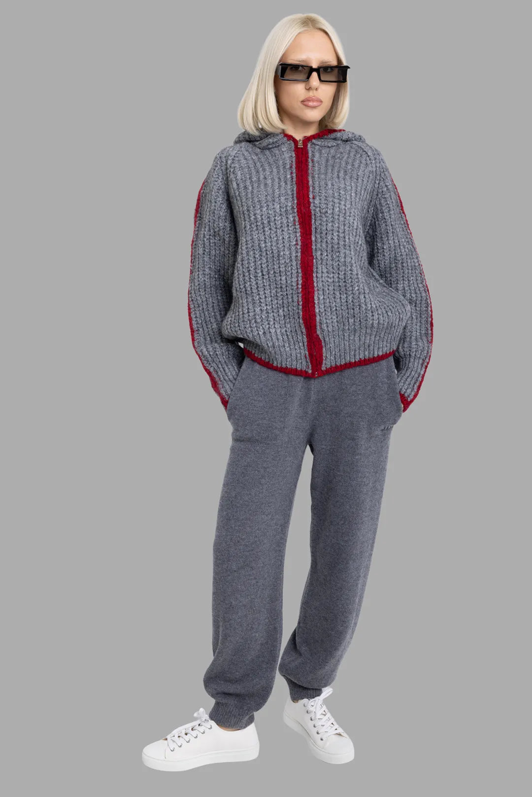 MSGM women's grey hooded knit zip cardigan, full-length front view on model, red contrast trim along zip and cuffs.