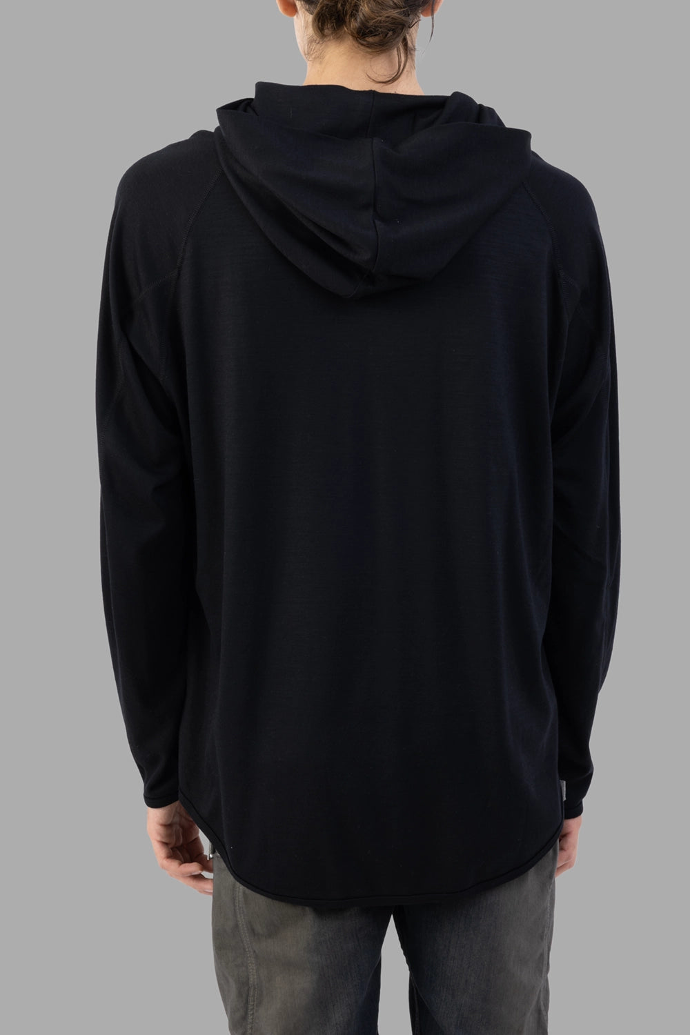 Attachment hoodie in black, back view, relaxed hood and raglan sleeve seams