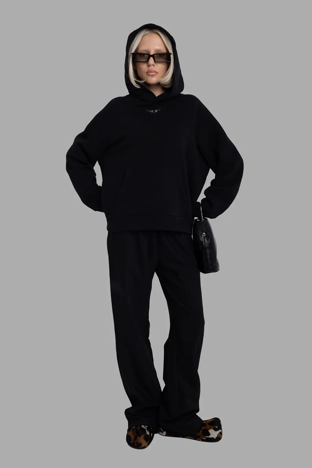 Zadig & Voltaire women's black hoodie in cotton blend, on-model full length, rhinestone wings logo at chest.