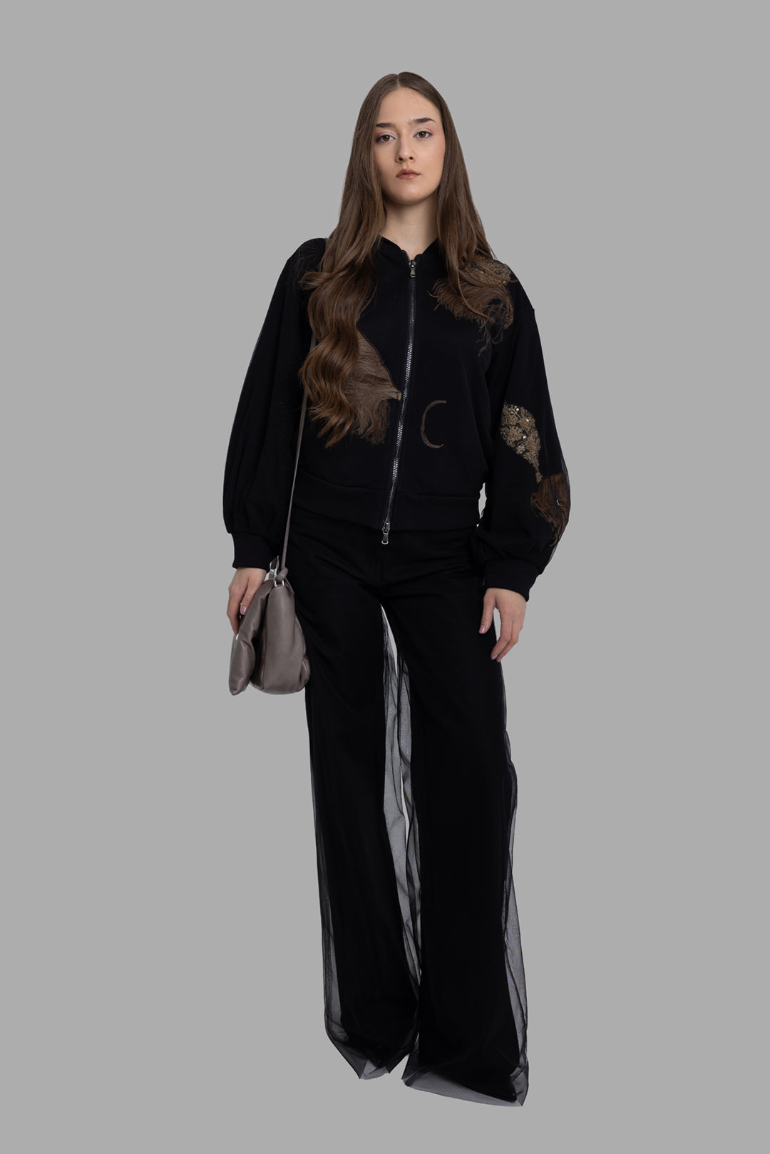 Sehnsucht women's hoodie in black, full-length view, feathered appliqués and moon embroidery.