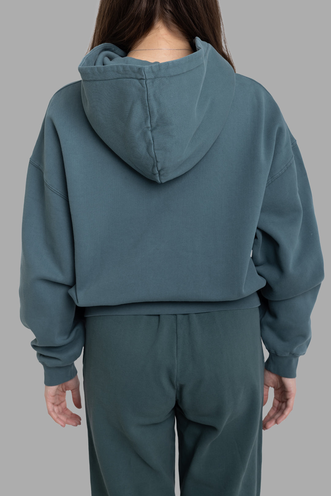 Anine Bing women’s dark teal Harvey Paris hoodie, back view with relaxed dropped shoulders and plain hood