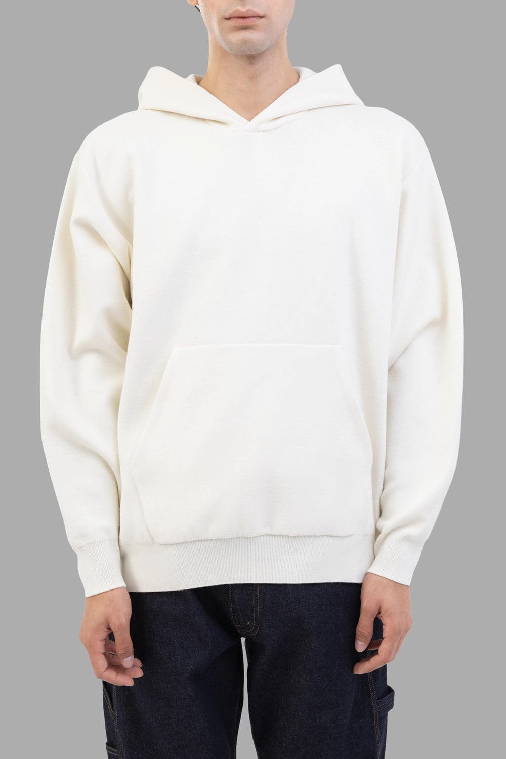 ATTACHMENT hoodie in off white, front view, kangaroo pocket and ribbed hem