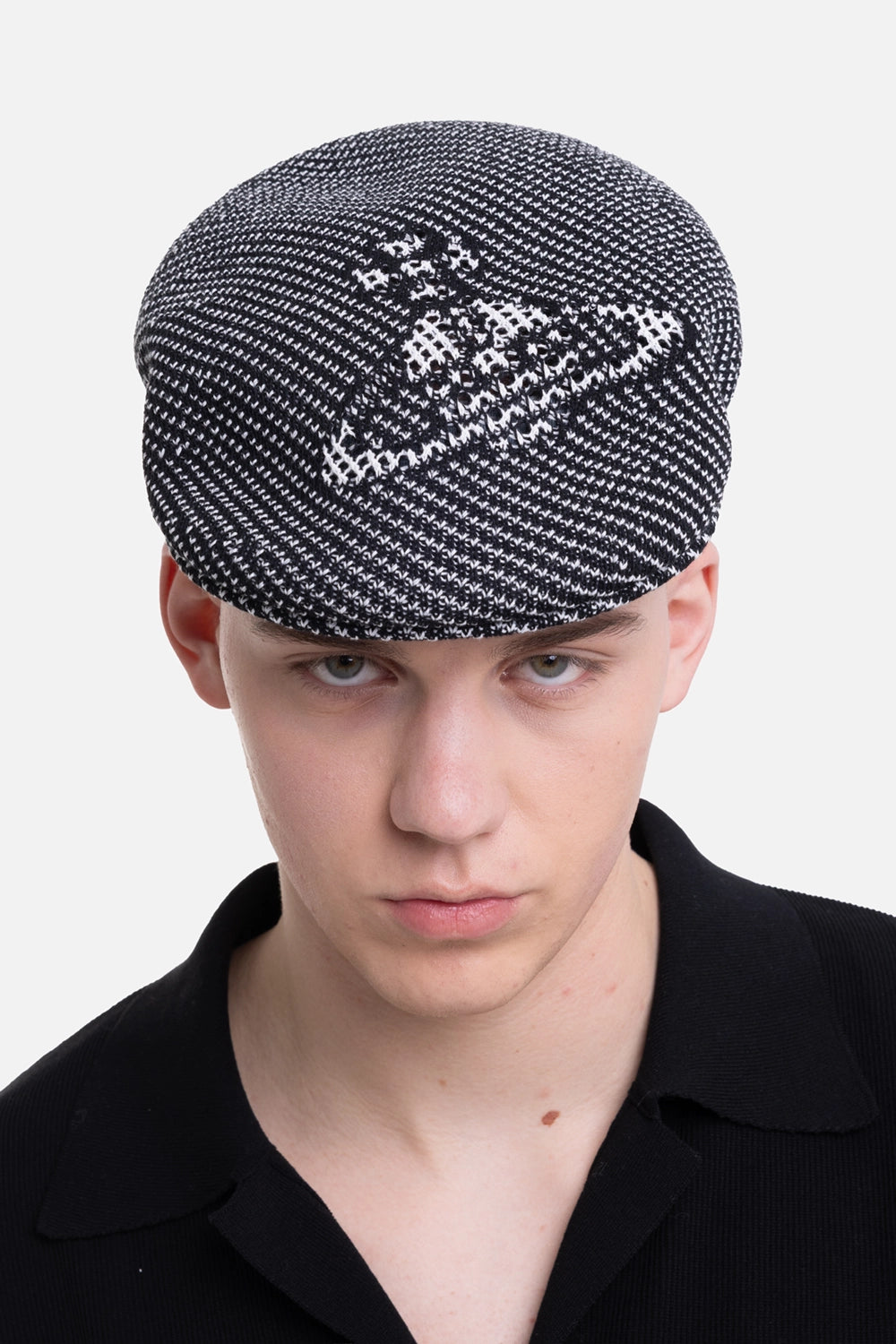 Vivienne Westwood unisex hunting beret in black, front view, white Orb motif and flat cap brim