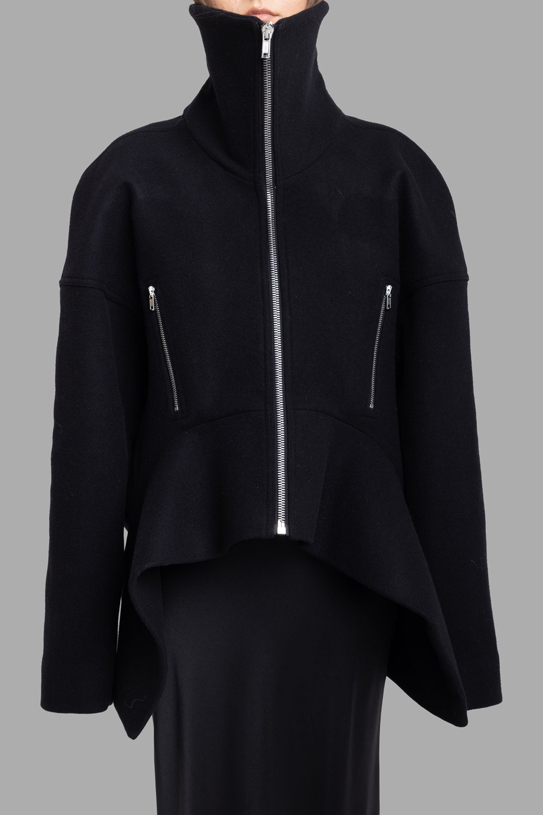 Rick Owens women's black wool Draculimo jacket, front half-length view, zipped high funnel collar and silver zip pockets