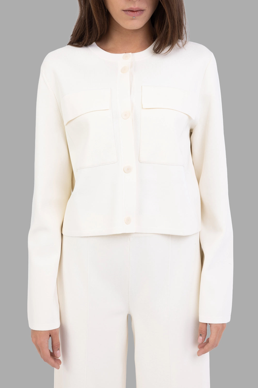 Joseph women jacket in ivory, front view, round neck with tonal buttons and two flap patch pockets