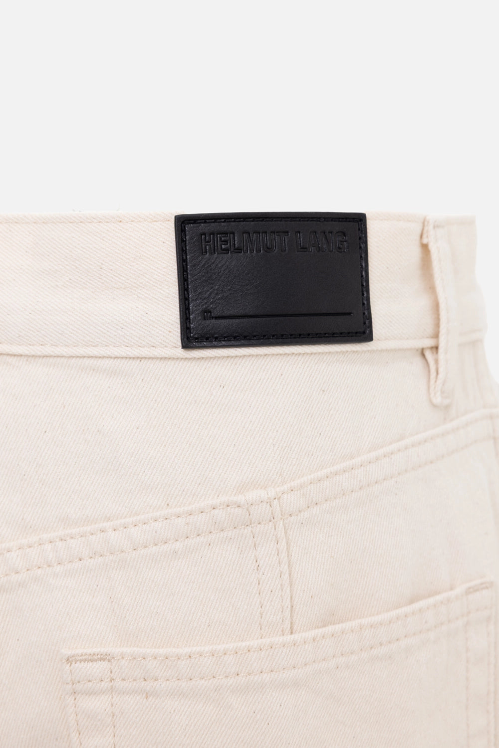 Helmut Lang women's jeans in ecru, logo detail, black leather waistband patch with embossed branding