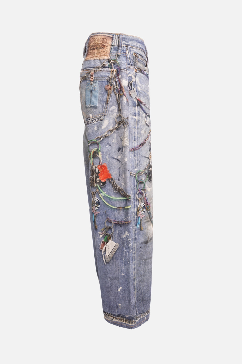 Acne Studios women's pre-owned jeans in mid blue, back view, logo leather patch and printed chains across pockets