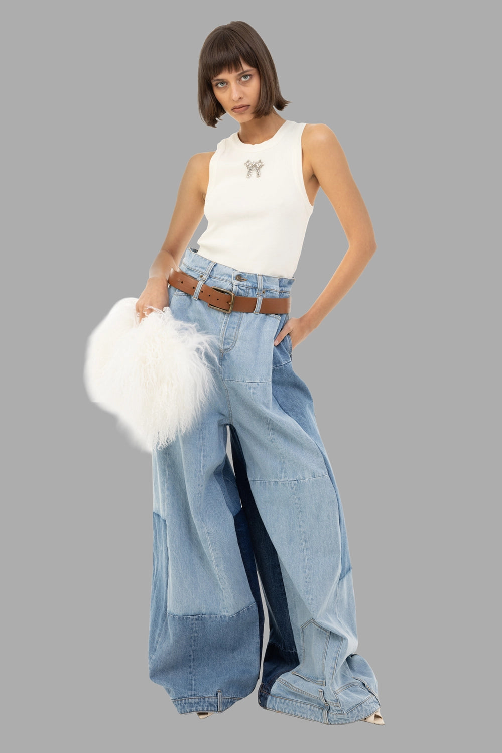 A.W.A.K.E. MODE women's jeans in Mid Blue, on-model full length, patchwork panels and ultra-wide leg