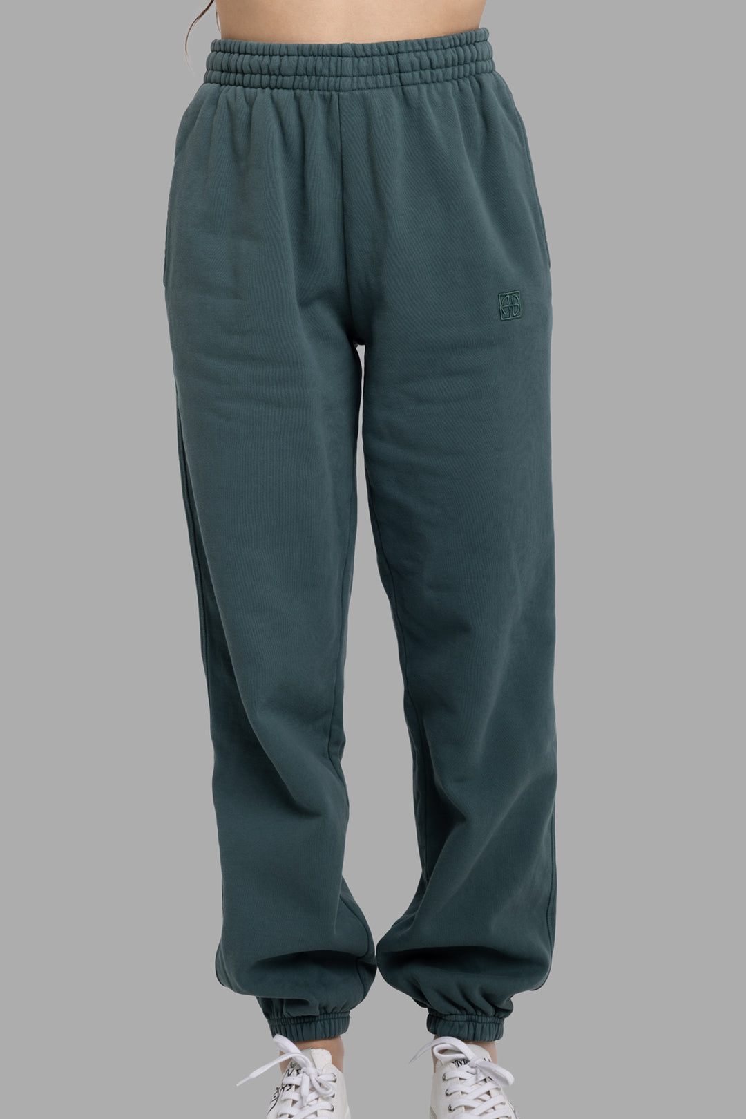 Anine Bing women's dark teal Karter jogger sweatpants, front view, elastic waistband and tonal framed monogram logo