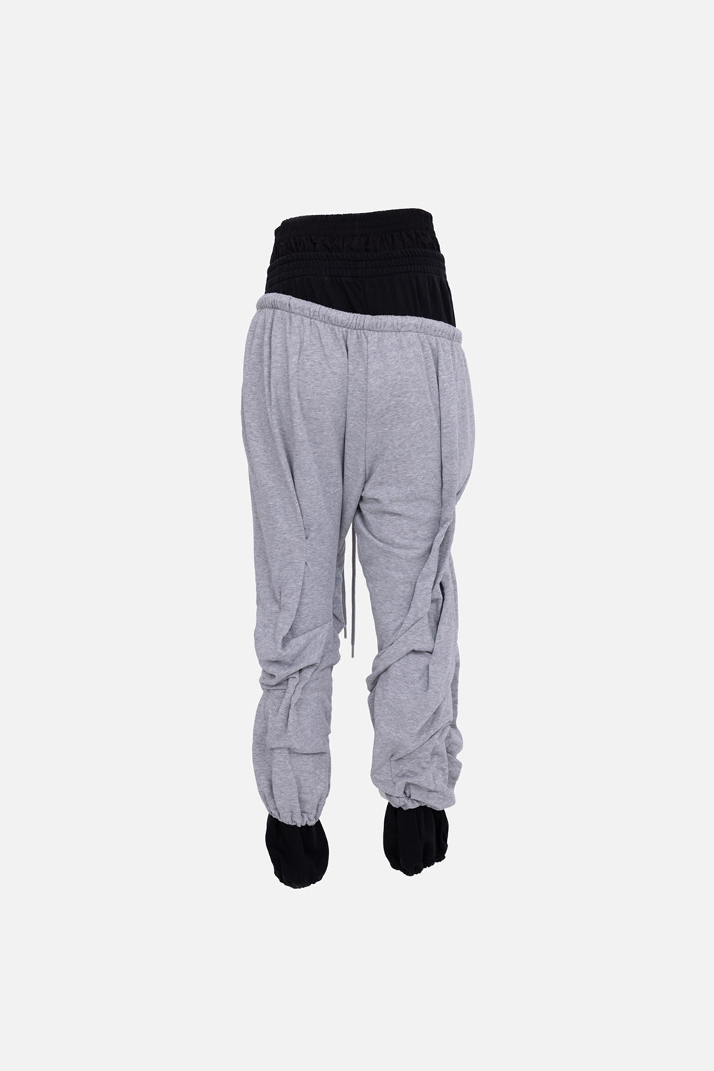 Natasha Zinko women’s joggers in black/grey, back view, draped seat and contrast black underlayer waistband.