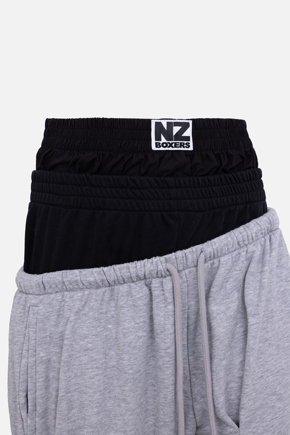 Natasha Zinko women’s joggers in black/grey, logo detail, layered NZ BOXERS waistband and drawstring waist.