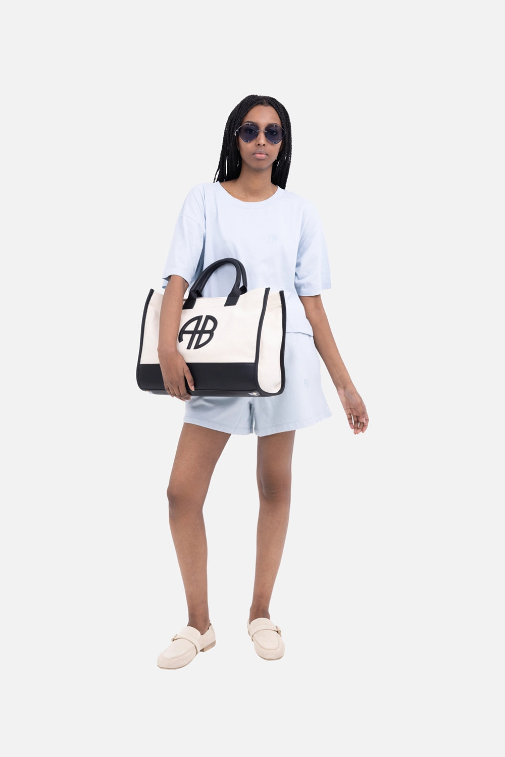 ANINE BING women's Kam sweat shorts in pale blue, on-model fit