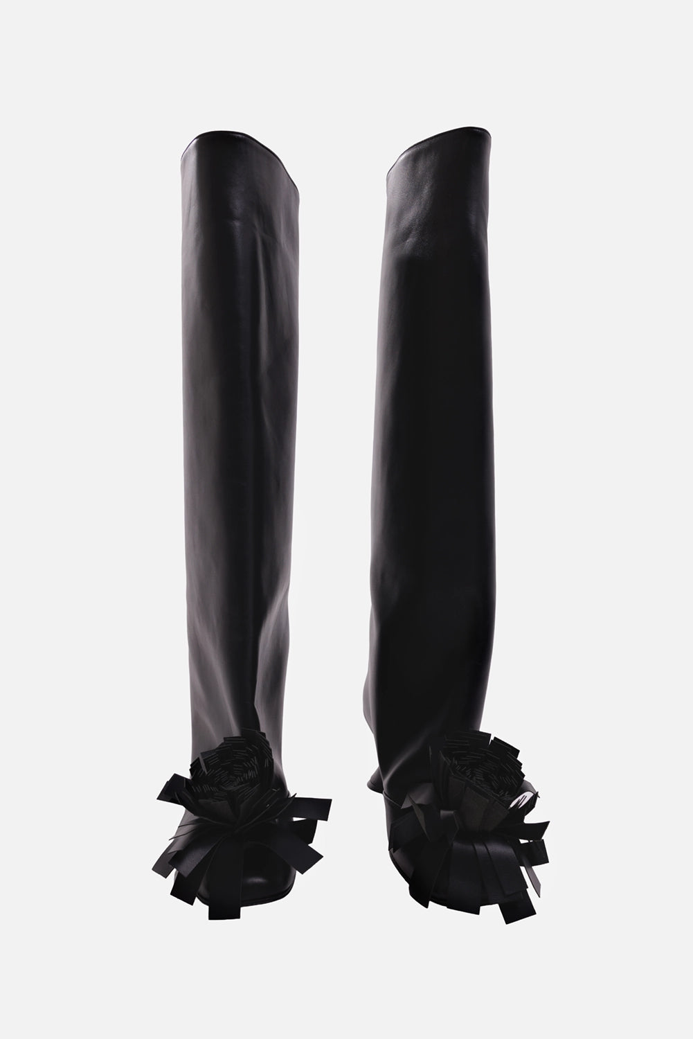 A.W.A.K.E. MODE women's black knee-high boots, front view with wide shafts, square toes and pom-pom trim
