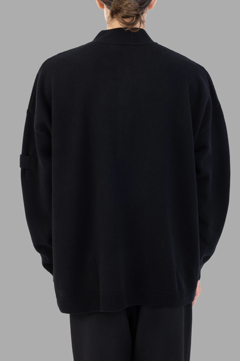AION knit pullover in black, back view, ribbed hem and cuffs