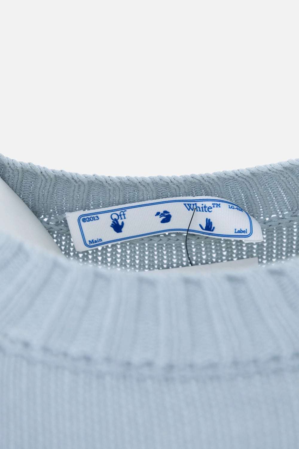 Pre-owned Off-White knit sweater in ice blue, neck label close-up, woven Off White™ label
