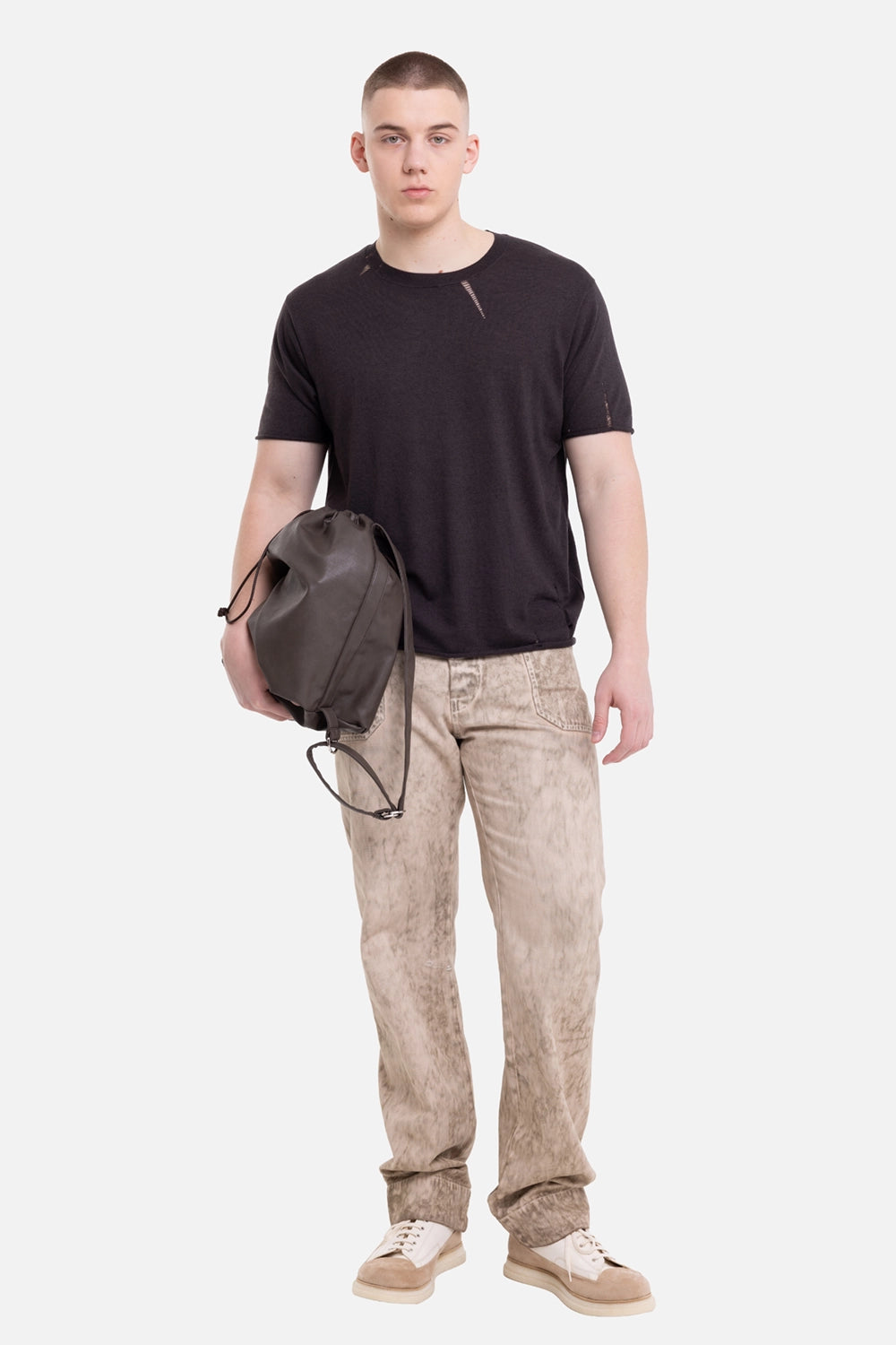 VEIN men's dark brown knit T-shirt, on-model full-length view, sheer knit and laddered slash details