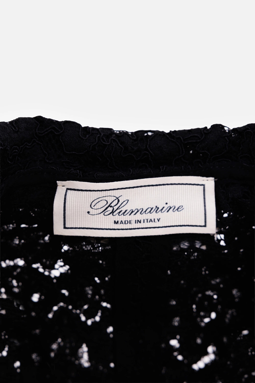 Blumarine women's lace blazer set in black, label detail, Made in Italy tag on floral lace