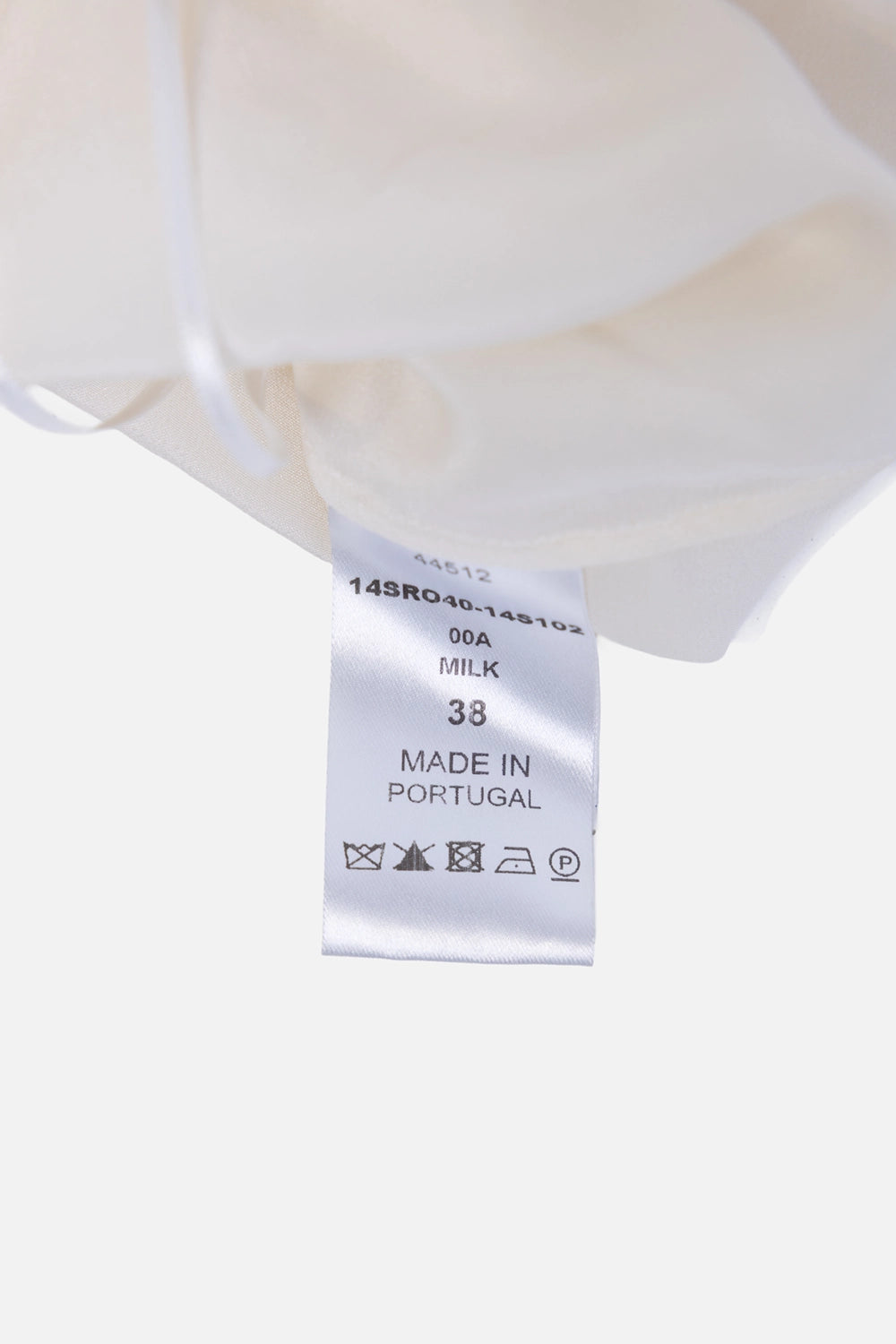 Pre-owned Chloé lace dress in milk, tag close-up, style code and size label made in Portugal