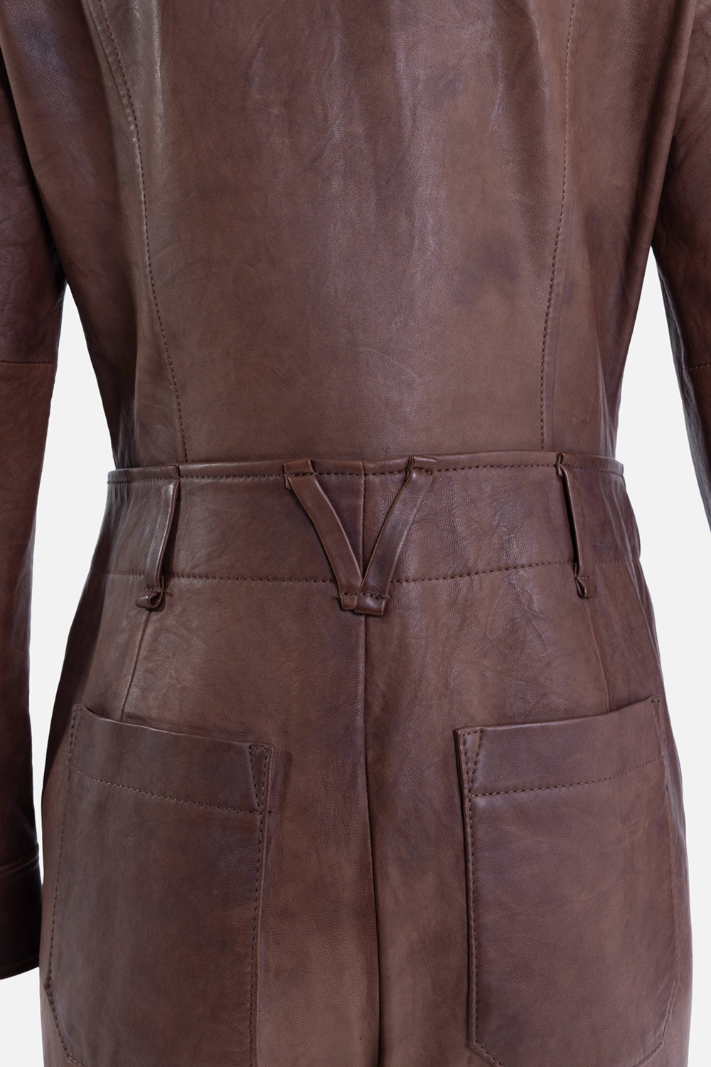 Pre-owned Veronica Beard women's leather jumpsuit in brown, waist detail view, belt loops and oversized patch pockets