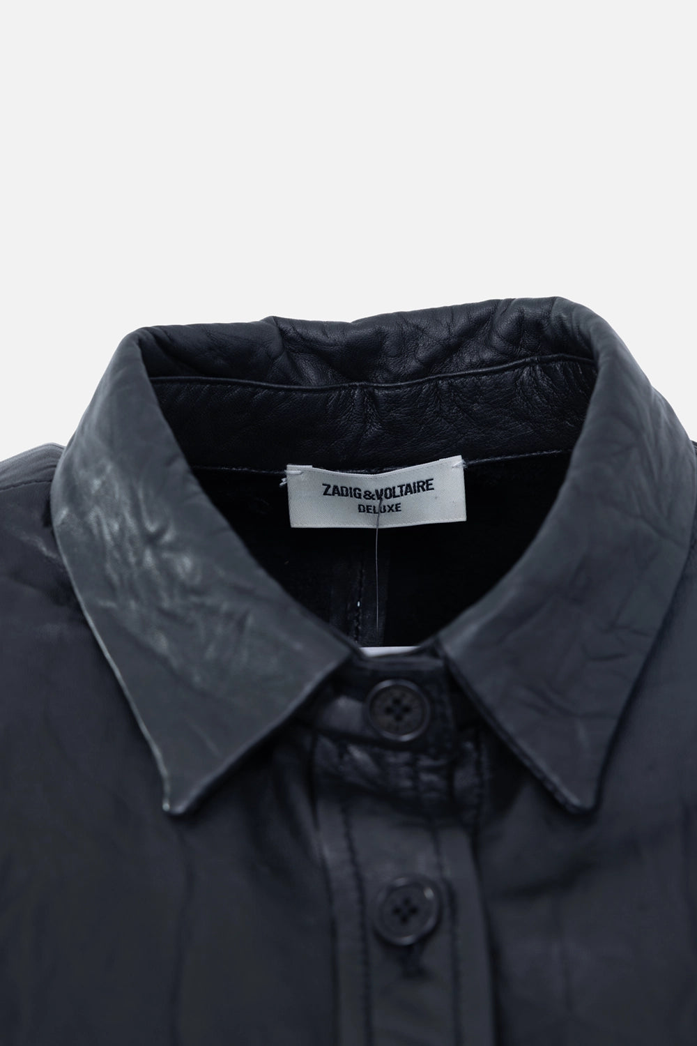 Pre-owned Zadig & Voltaire women's leather shirt in black, label close-up, pointed collar and top buttons