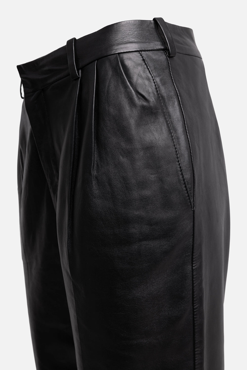 Pre-owned Saint Laurent women leather trousers in black, side view, slanted pocket opening and stitched side seam