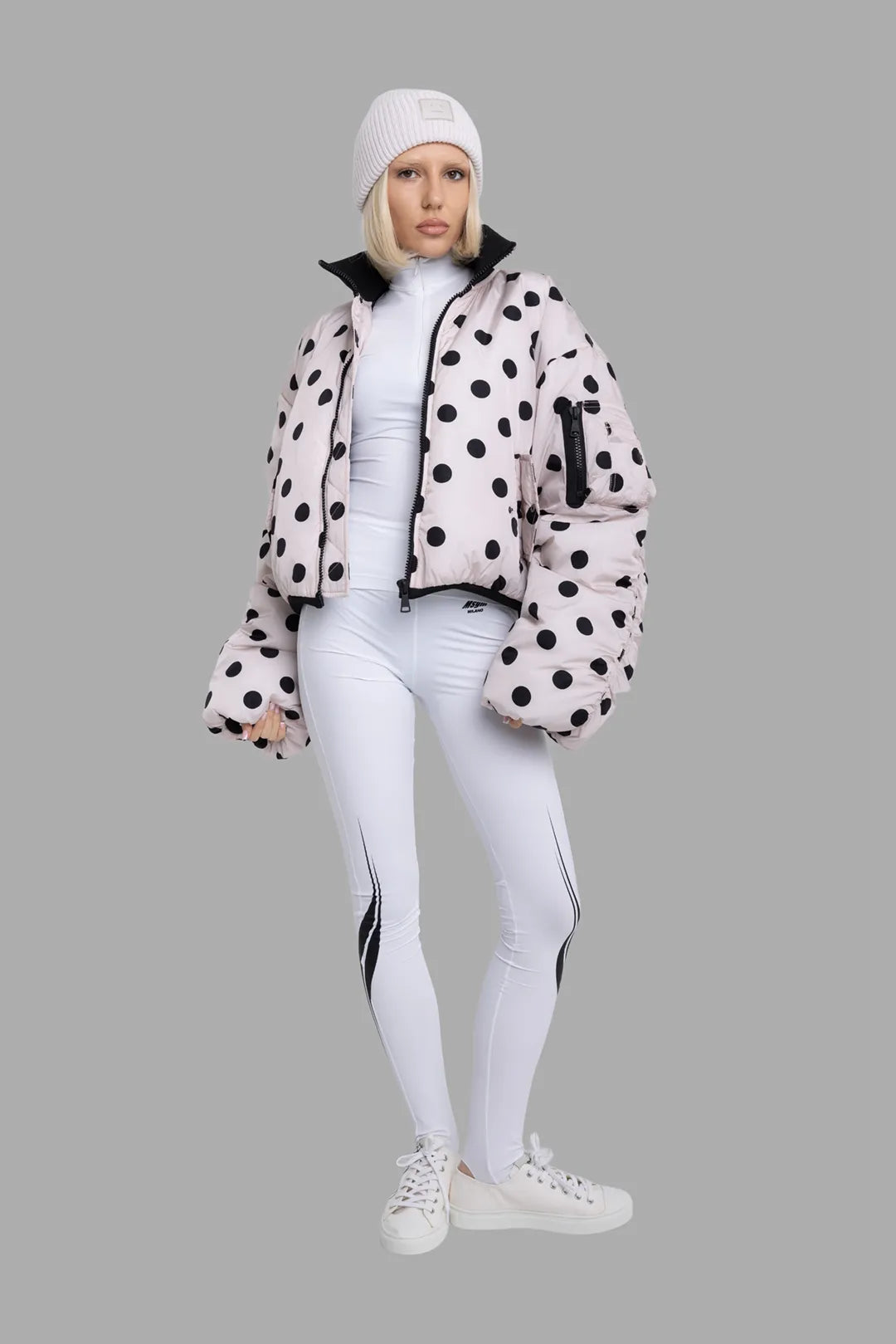 MSGM women's white Lycra leggings, on-model full length front view with black race print