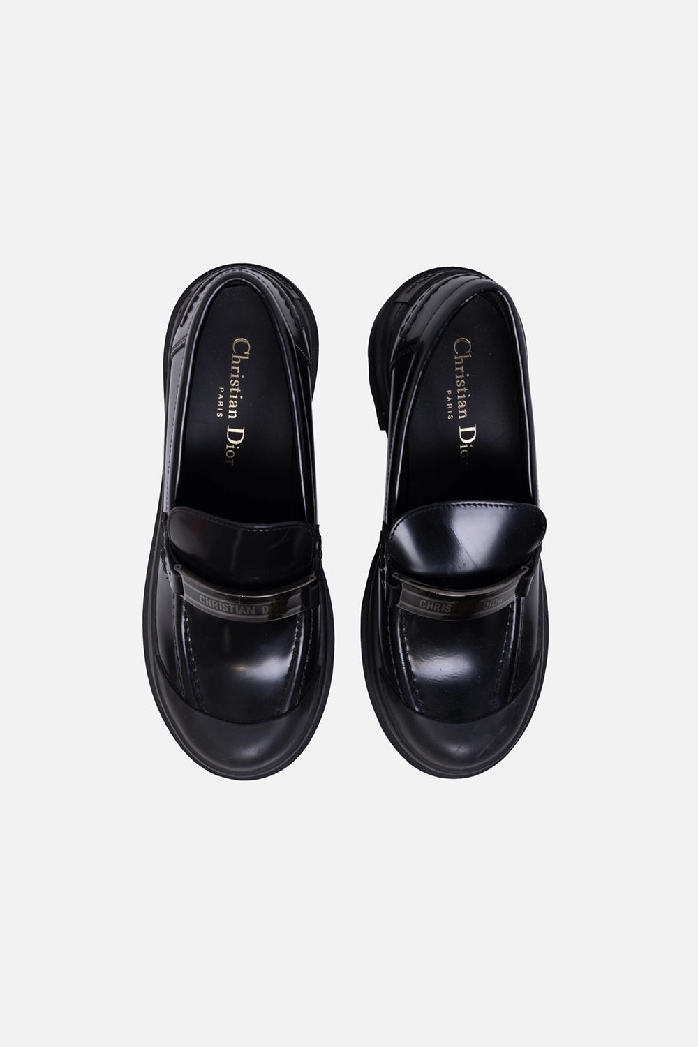 Pre-owned Christian Dior women's loafers in black, top view, glossy plaque strap and gold insole logo