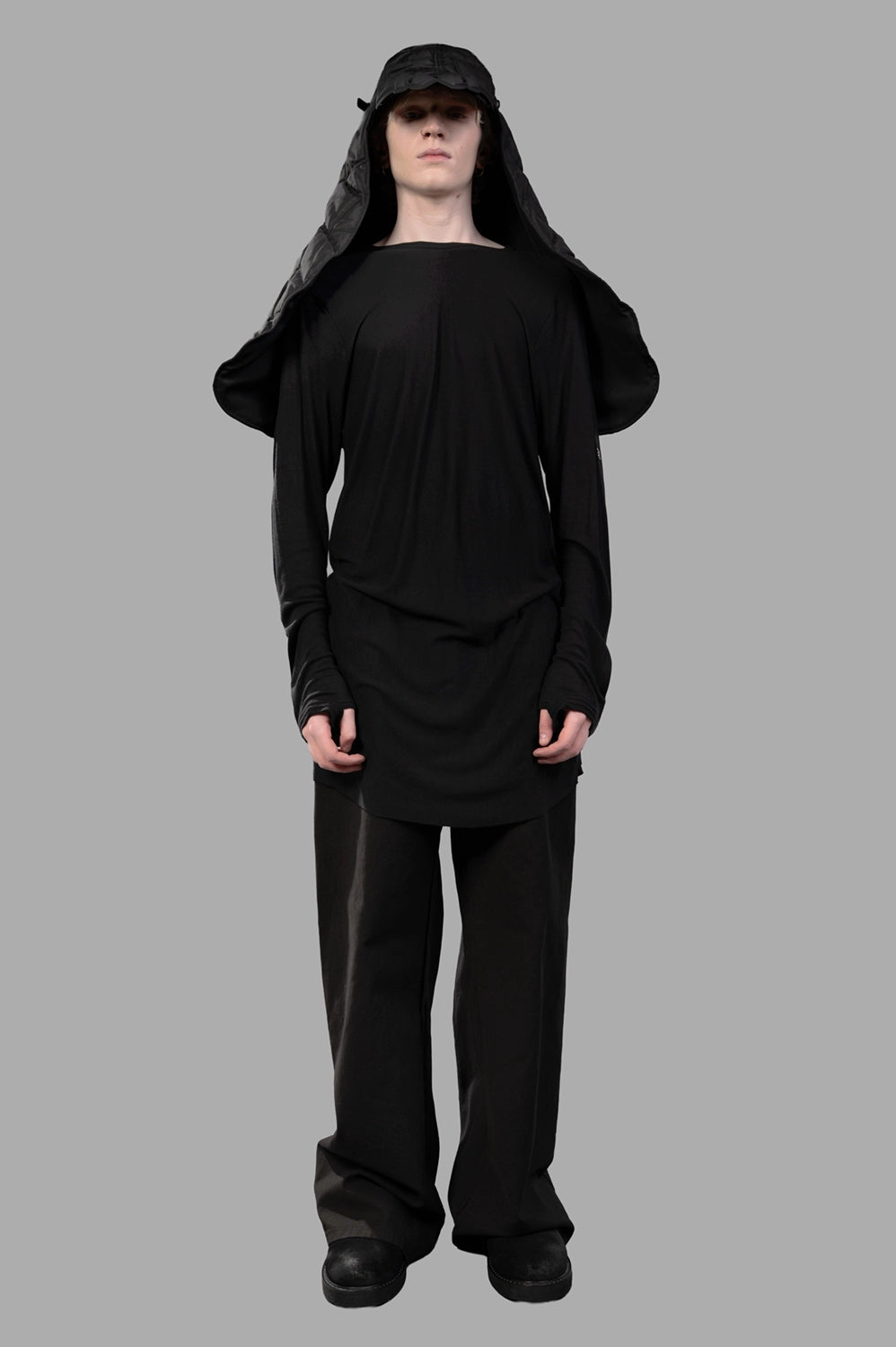 69 by Isaac Sellam long-sleeve t-shirt in black, on-model full length, longline drape and layered hem