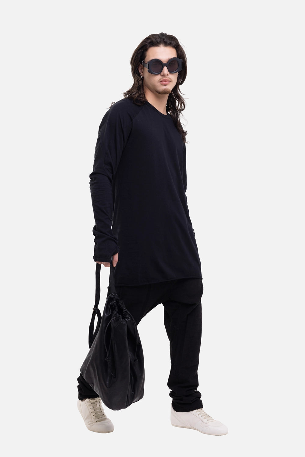 69 by Isaac Sellam men's long-sleeve T-shirt in black, on-model full-length view, raw hem