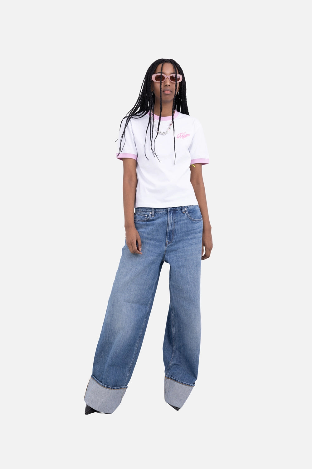 Helmut Lang women's low-rise drop jeans in classic blue, on-model full-length, oversized folded cuffs