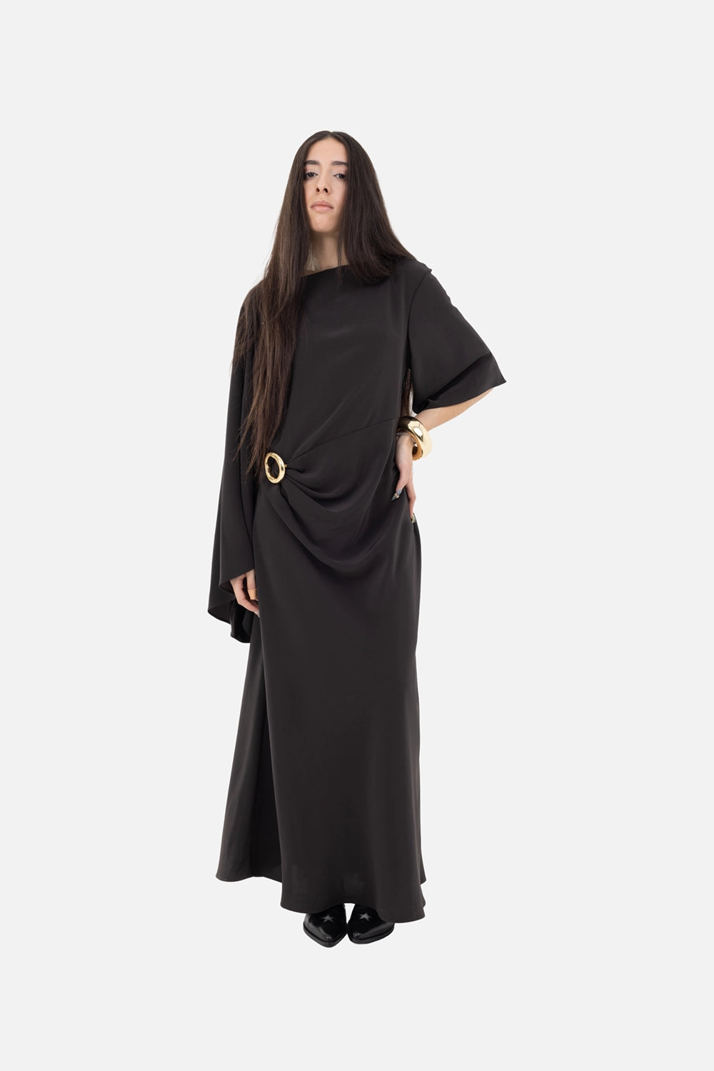 JOSEPH womens maxi dress in cocoa, on-model full-length, asymmetric cape sleeve with gold ring waist detail