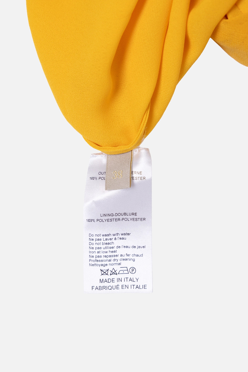 Pre-owned Elie Saab fringed maxi skirt in golden yellow, care label close-up, outer and lining polyester text