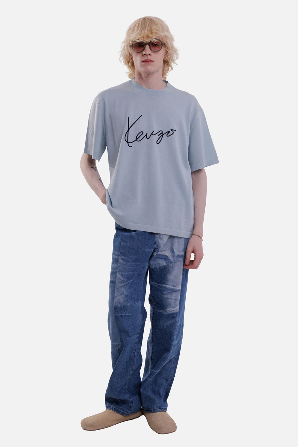 KENZO men's sky blue merino wool T-shirt, full-length view with black signature embroidery and relaxed shoulders