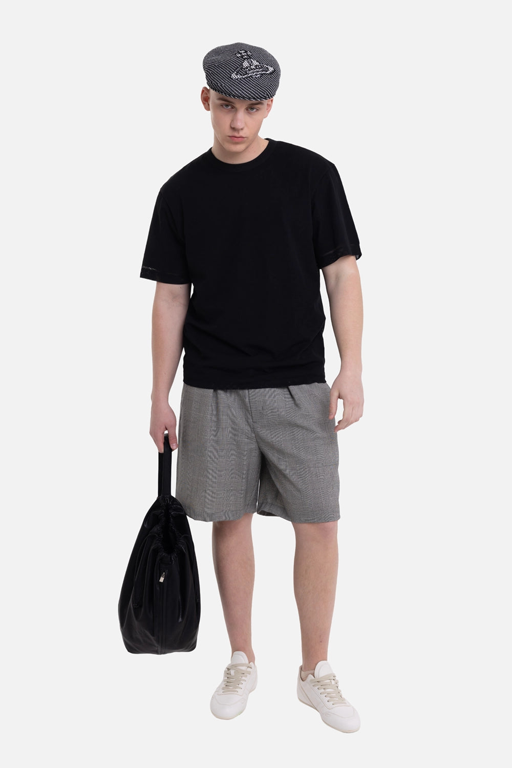 Helmut Lang men's black mesh T-shirt, on-model full-length view, relaxed fit and sheer sleeve edges