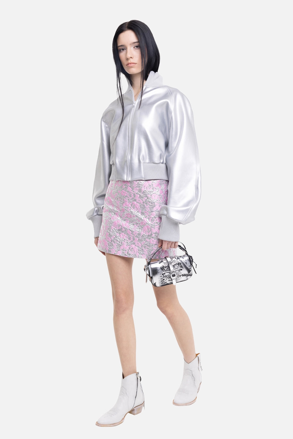 Des Phemmes women's micro skirt in silver/candy pink, on-model full-length view, slim mini silhouette
