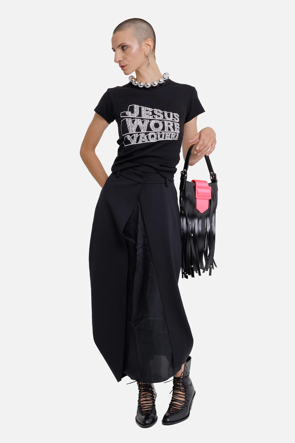 Giovanni Cavagna women's black midi skirt, full-length on-model view with sculpted asymmetric hem