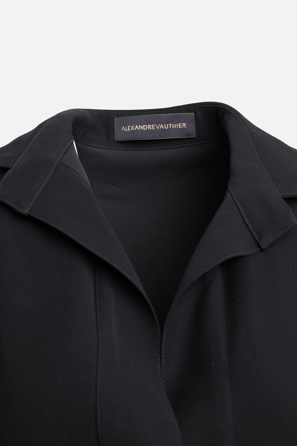 Pre-owned Alexandre Vauthier women's mini dress in black, label view, woven neck label at collar