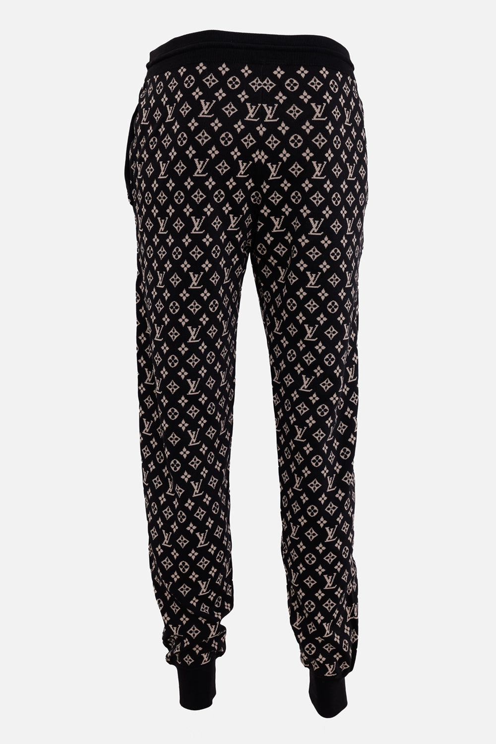 Louis Vuitton women's jogging pants in black and camel, back view with ribbed waistband and allover Monogram
