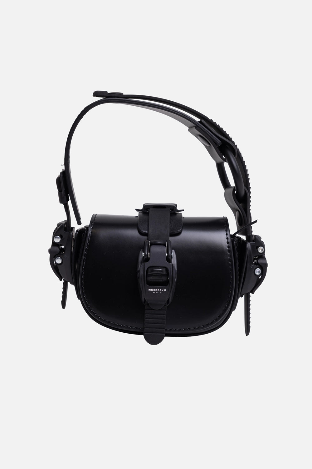 INNERAUM Berlin unisex nano crossbody bag in black, front view, signature clasp and serrated side hardware