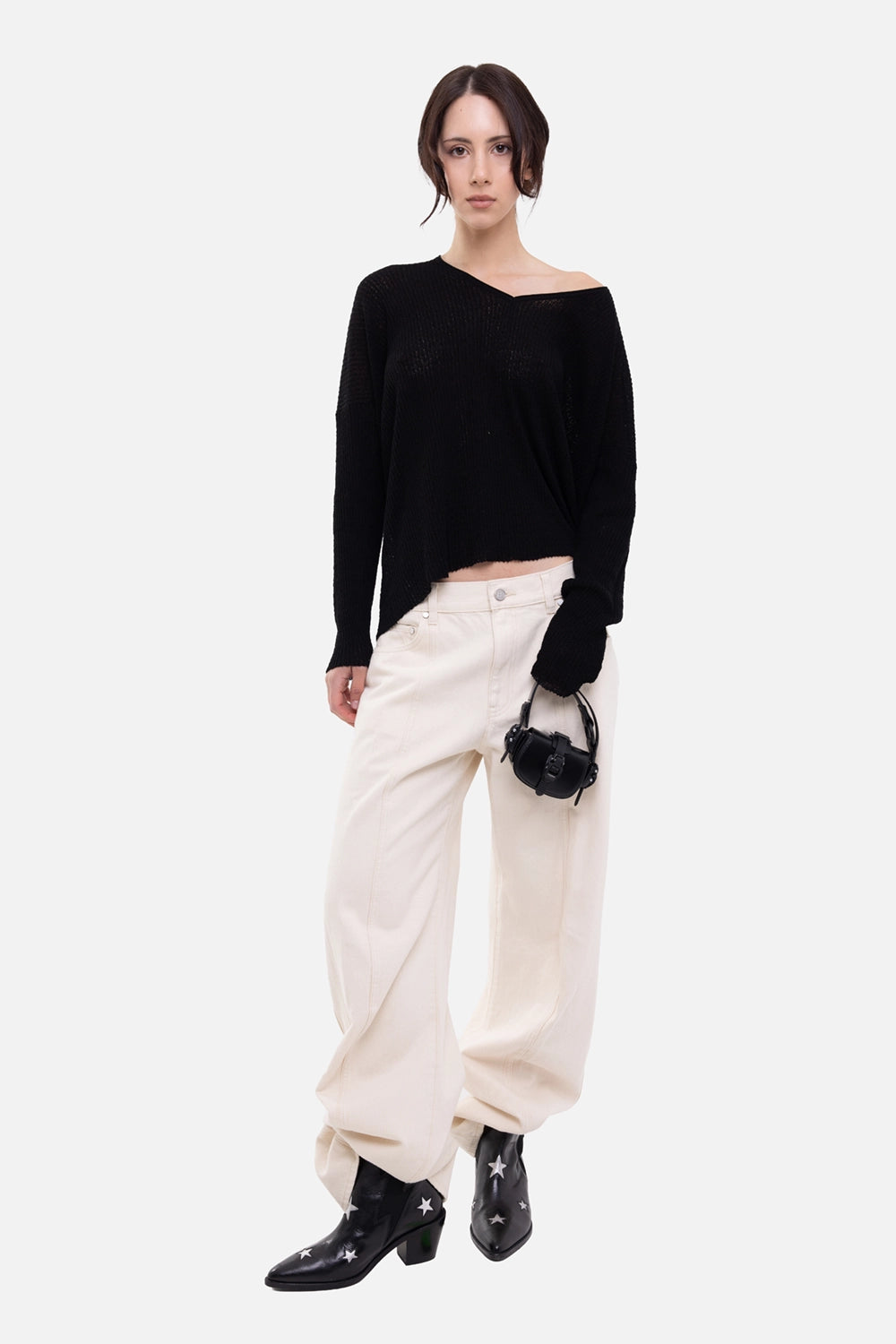 Gentry Portofino women's sweater in black, on-model full-length, off-shoulder V-neck and cropped open knit